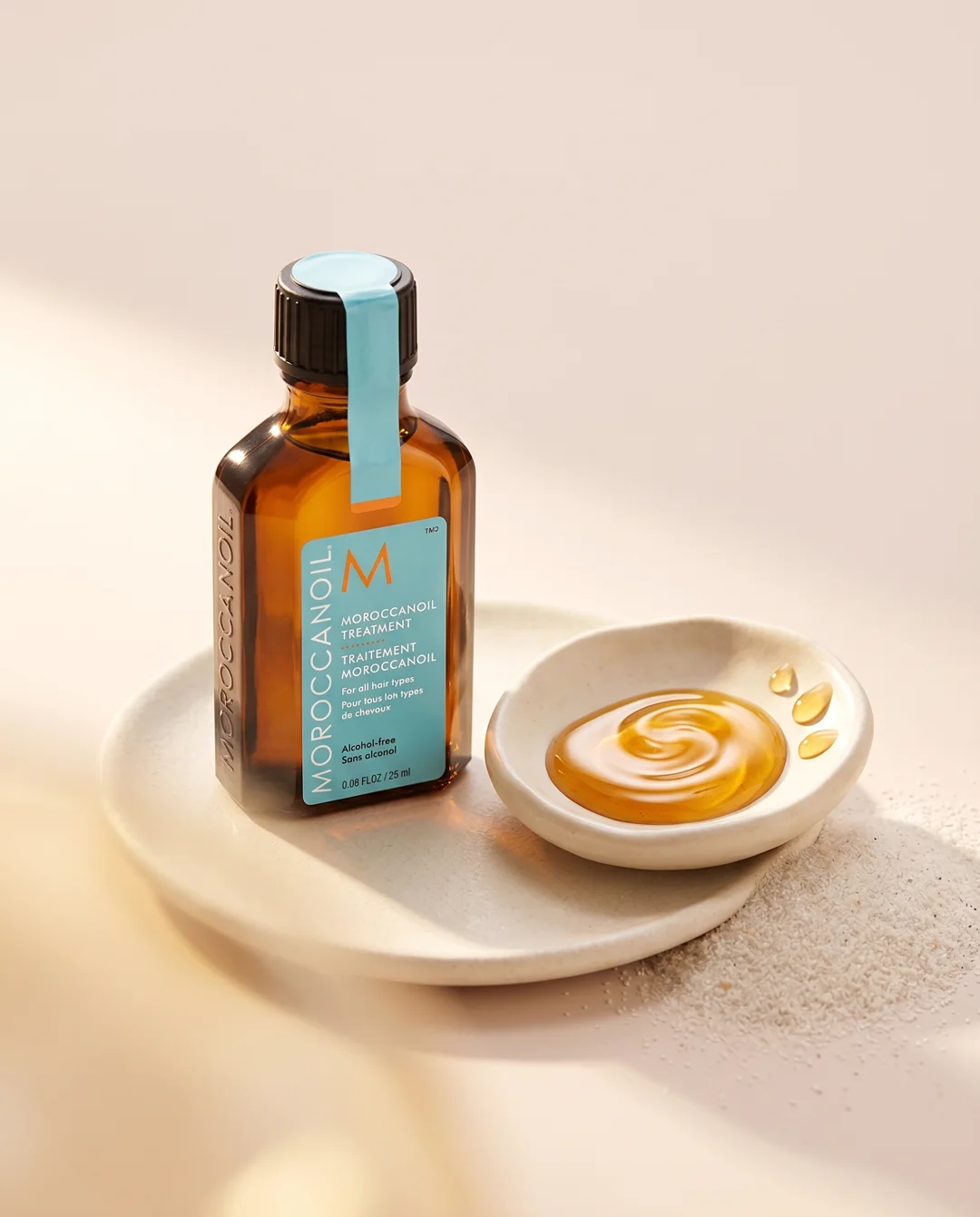 Moroccanoil hårolja med gyllene oljedroppe
